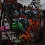 Circular metallic bird feeder