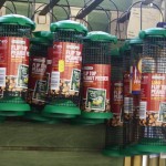 Fliptop peanut feeder for wild birds